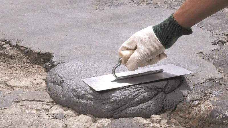 Concrete contractor working with concrete.