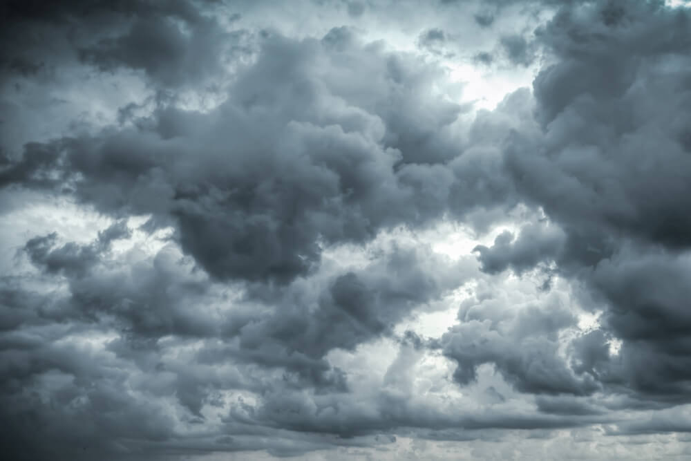 Dark clouds, indicating bad weather.